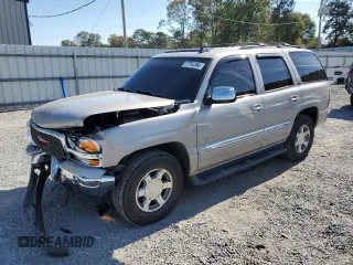 2006 GMC Yukon SLT with VIN 1GKEK13T96J110533, listed as a Copart auction lot 77797364 with 209,339 mi miles and Salvage Title. Bid and sale history available at carsss.com. Image 1.