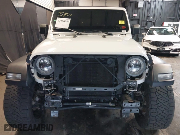 2019 Jeep Wrangler Unlimited Sport S z VIN 1C4HJXDG4KW639403, wystawiony jako IAAI lot #42158096 z przebiegiem 132 569 mil mil oraz . Historia ofert i sprzedaży dostępna na DreamBid. Obrazek 6.
