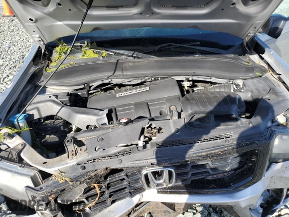 2013 Honda Ridgeline Sport z VIN 5FPYK1F70DB018035, wystawiony jako Copart lot #50519355 z przebiegiem Nie podano mil oraz Szkoda całkowita • Salvage title. Historia ofert i sprzedaży dostępna na DreamBid. Obrazek 13.