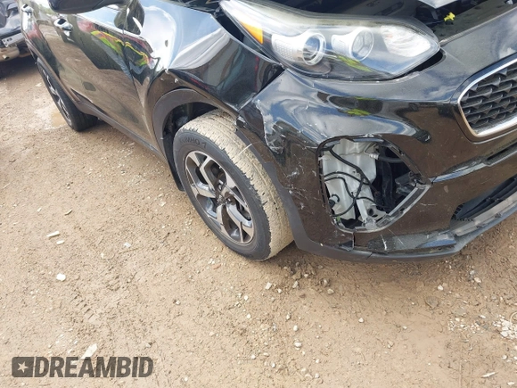 2020 Kia Sportage LX with VIN KNDPM3AC7L7755719, listed as a IAAI auction lot 42026994 with 49,537 mi miles and . Bid and sale history available at DreamBid. Image 6.