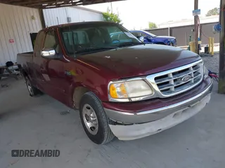 1999 Ford F-150 with VIN 1FTZX1721XNA79241, listed as a IAAI auction lot 42186220 with Not provided miles and . Bid and sale history available at DreamBid. Image 1.
