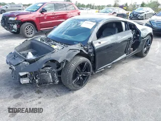 2014 Audi R8 z VIN WUAAUAFG6EN001685, wystawiony jako IAAI lot #42170982 z przebiegiem 19 588 mil mil oraz . Historia ofert i sprzedaży dostępna na DreamBid. Obrazek 2.