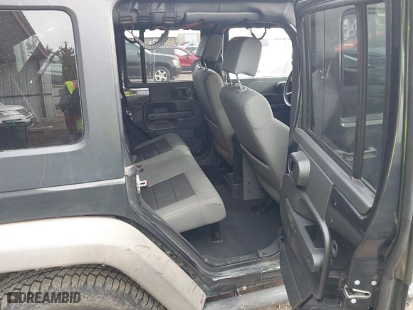 2010 Jeep Wrangler Unlimited Sport with VIN 1J4BA3H13AL125010, listed as a IAAI auction lot 41734482 with 183,773 mi miles. Bid and sale history available at carsss.com. Image 8.