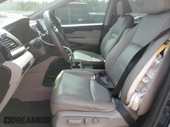 2021 Honda Odyssey Touring with VIN 5FNRL6H83MB028717, listed as a Copart auction lot 49236485 with 63,576 mi miles and Salvage Title. Bid and sale history available at carsss.com. Image 7.