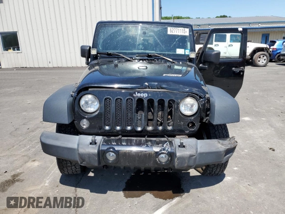 2014 Jeep Wrangler Sport with VIN 1C4AJWAG2EL113843, listed as a Copart auction lot 62771115 with 70,089 mi miles and Salvage title. Bid and sale history available at DreamBid. Image 5.