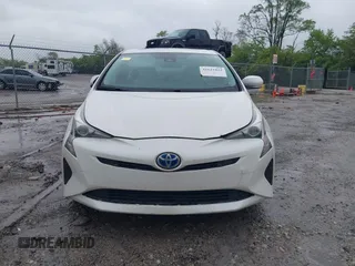 2018 Toyota Prius Two with VIN JTDKARFU9J3054742, listed as a IAAI auction lot 41641032 with 209,986 mi miles and . Bid and sale history available at DreamBid. Image 12.