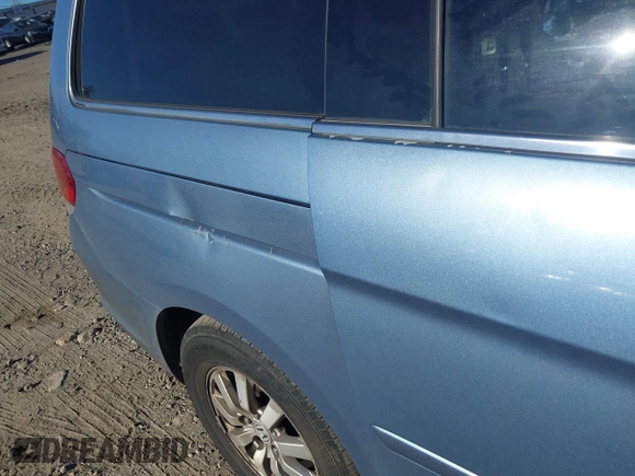 2010 Honda Odyssey EX-L with VIN 5FNRL3H77AB096732, listed as a IAAI auction lot 41831744 with 22,523 mi miles and . Bid and sale history available at DreamBid. Image 6.