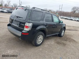 2009 Mercury Mariner Hybrid with VIN 4M2CU29359KJ09642, listed as a IAAI auction lot 41734762 with 233,989 mi miles. Bid and sale history available at carsss.com. Image 4.