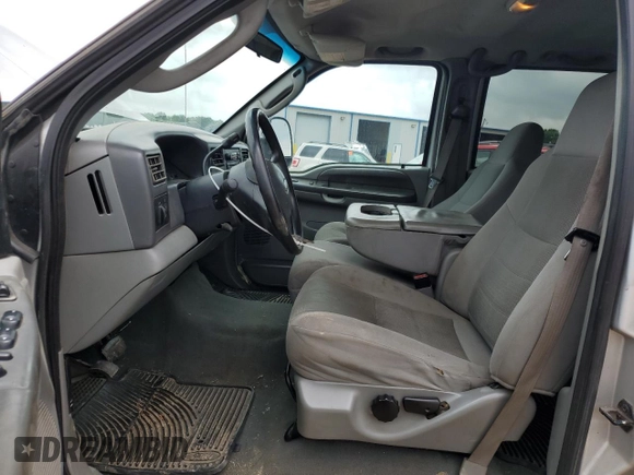 2004 Ford F-250 XL with VIN 1FTNW21L94EE03900, listed as a Copart auction lot 57838765 with 185,837 mi miles and Salvage title. Bid and sale history available at DreamBid. Image 7.