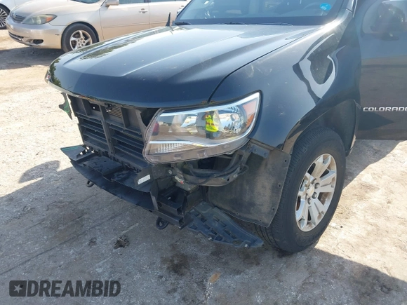 2018 Chevrolet Colorado 4WD LT z VIN 1GCGTCEN0J1265248, wystawiony jako IAAI lot #42247568 z przebiegiem 74 863 mil mil oraz . Historia ofert i sprzedaży dostępna na DreamBid. Obrazek 20.