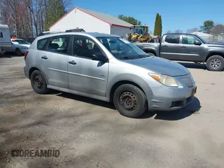 2007 Pontiac Vibe with VIN 5Y2SL65807Z427945, listed as a IAAI auction lot 42092638 with 230,417 mi miles. Bid and sale history available at carsss.com. Image 1.