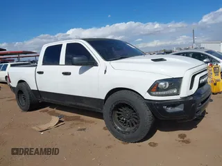 2015 Ram 1500 Rebel z VIN 1C6RR6YT3FS741990, wystawiony jako IAAI lot #41544261 z przebiegiem 233 057 mil mil oraz . Historia ofert i sprzedaży dostępna na DreamBid. Obrazek 1.