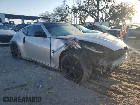 2015 Nissan 370Z with VIN JN1AZ4EH2FM443464, listed as a Copart auction lot 83410654 with 116,692 mi miles and Salvage Title. Bid and sale history available at carsss.com. Image 4.