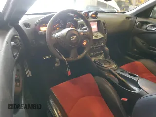 2016 Nissan 370Z Nismo с VIN JN1AZ4EH7GM930385, выставлен на аукционе Copart как лот 48208185 с пробегом 66 972 миль миль и Списание • Salvage title. История ставок и продаж доступна на DreamBid. Изображение 8.