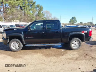 2011 Chevrolet Silverado 1500 LT with VIN 3GCPKSE33BG320029, listed as a IAAI auction lot 41805671 with 110,000 mi miles. Bid and sale history available at carsss.com. Image 15.