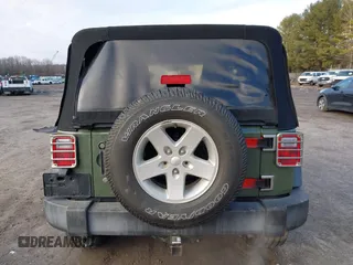 2016 Jeep Wrangler Sport with VIN 1C4AJWAG7GL330159, listed as a IAAI auction lot 41530415 with 98,554 mi miles and . Bid and sale history available at carsss.com. Image 16.