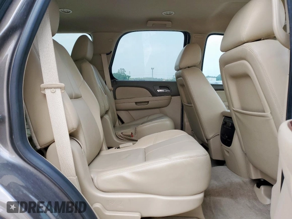 2013 Chevrolet Tahoe LT z VIN 1GNSCBE02DR364014, wystawiony jako Copart lot #57785315 z przebiegiem 149 977 mil mil oraz Szkoda całkowita • Salvage title. Historia ofert i sprzedaży dostępna na DreamBid. Obrazek 11.