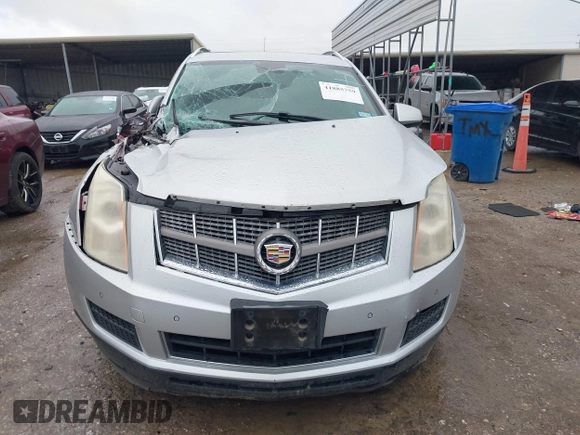 2011 Cadillac SRX Luxury Collection with VIN 3GYFNAEY5BS678474, listed as a IAAI auction lot 41885759 with 176,341 mi miles. Bid and sale history available at carsss.com. Image 12.