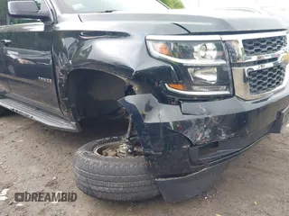 2017 Chevrolet Tahoe LT z VIN 1GNSKBKC3HR164976, wystawiony jako IAAI lot #42263818 z przebiegiem 99 261 mil mil oraz . Historia ofert i sprzedaży dostępna na DreamBid. Obrazek 6.