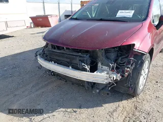 2021 Chrysler Voyager L z VIN 2C4RC1AG1MR542042, wystawiony jako IAAI lot #40626082 z przebiegiem 119 431 mil mil oraz . Historia ofert i sprzedaży dostępna na DreamBid. Obrazek 6.