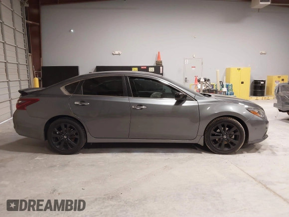 2018 Nissan Altima 2.5 SR with VIN 1N4AL3AP1JC203798, listed as a IAAI auction lot 41853789 with 77,875 mi miles. Bid and sale history available at carsss.com. Image 13.