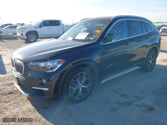 2018 BMW X1 sDrive28i with VIN WBXHU7C37J5H43318, listed as a IAAI auction lot 41294730 with 73,600 mi miles. Bid and sale history available at carsss.com. Image 17.