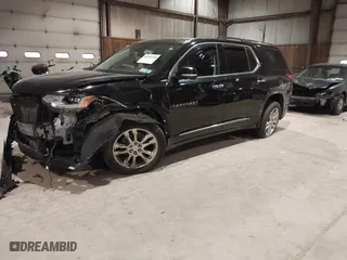 2021 Chevrolet Traverse High Country with VIN 1GNEVNKW9MJ150993, listed as a IAAI auction lot 41224329 with 100,425 mi miles. Bid and sale history available at carsss.com. Image 18.