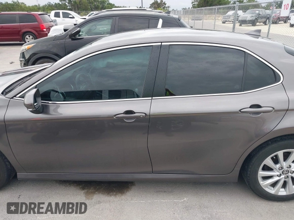 2023 Toyota Camry LE z VIN 4T1R11AK1PU169839, wystawiony jako IAAI lot #42140135 z przebiegiem 10 808 mil mil oraz . Historia ofert i sprzedaży dostępna na DreamBid. Obrazek 14.
