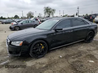 2015 Audi A8 3.0T z VIN WAU3GAFD3FN016050, wystawiony jako Copart lot #56054245 z przebiegiem 152 815 mil mil oraz Szkody całkowita. Historia ofert i sprzedaży dostępna na DreamBid. Obrazek 1.