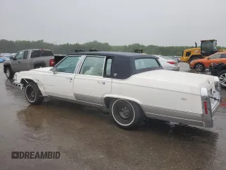 1992 Cadillac Brougham with VIN 1G6DW54E5NR708009, listed as a Copart auction lot 56849345 with 83,203 mi miles and Salvage title. Bid and sale history available at DreamBid. Image 2.