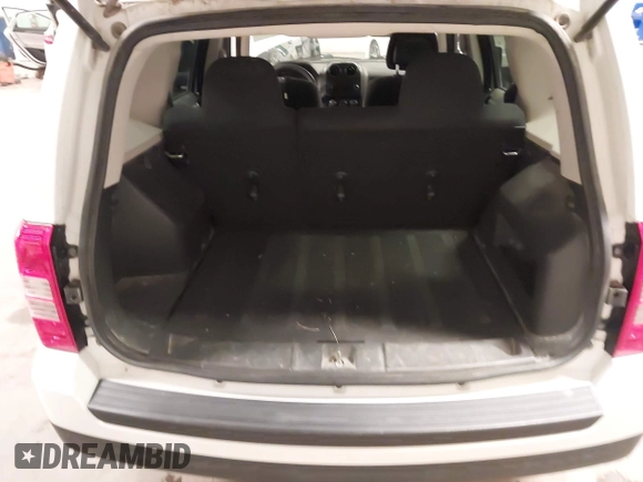 2014 Jeep Patriot Sport with VIN 1C4NJPBA6ED563281, listed as a IAAI auction lot 42392464 with 144,880 mi miles and . Bid and sale history available at DreamBid. Image 18.