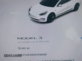 2020 Tesla Model 3 Standard Range Plus with VIN 5YJ3E1EAXLF590591, listed as a IAAI auction lot 42140338 with 79,342 mi miles and . Bid and sale history available at DreamBid. Image 7.