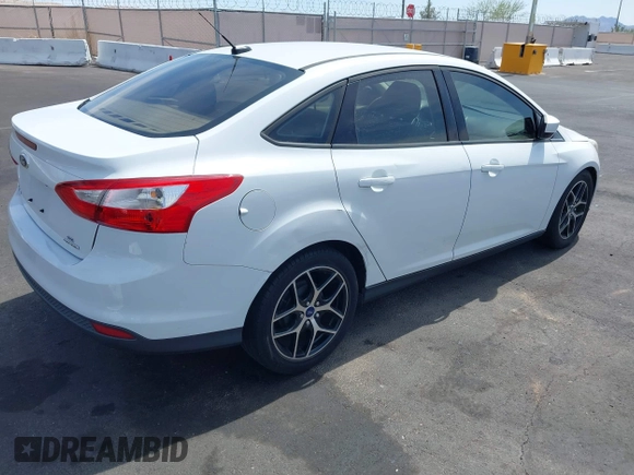 2012 Ford Focus SE with VIN 1FAHP3F24CL462319, listed as a IAAI auction lot 41981509 with 124,831 mi miles. Bid and sale history available at carsss.com. Image 4.