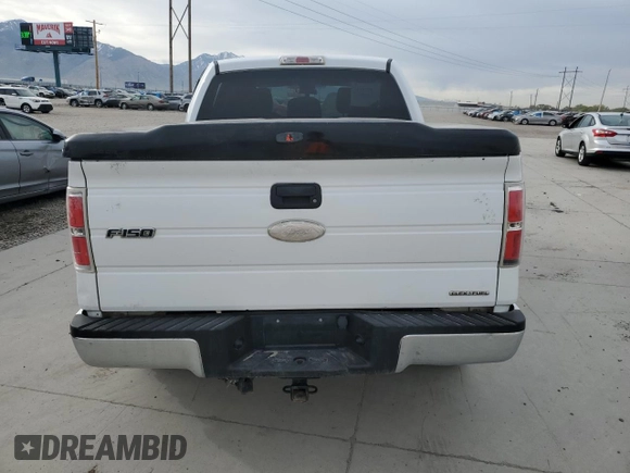 2012 Ford F-150 XL with VIN 1FTFW1EF0CFA48871, listed as a Copart auction lot 51699325 with 187,283 mi miles and Salvage title. Bid and sale history available at DreamBid. Image 6.