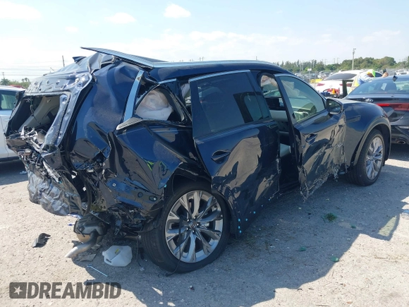2024 Mazda CX-90 Premium Plus with VIN JM3KKEHD8R1186750, listed as a IAAI auction lot 41795353 with 5,144 mi miles and . Bid and sale history available at DreamBid. Image 4.