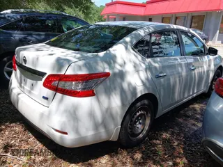 2014 Nissan Sentra S with VIN 3N1AB7AP8EL682996, listed as a IAAI auction lot 42707004 with 196,095 mi miles and . Bid and sale history available at DreamBid. Image 4.