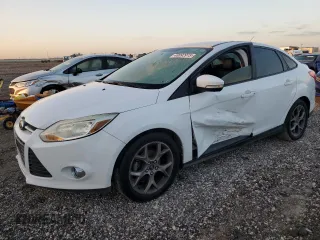 2013 Ford Focus SE z VIN 1FADP3F29DL252749, wystawiony jako Copart lot #48892915 z przebiegiem 156 692 mil mil oraz Szkoda całkowita • Salvage title. Historia ofert i sprzedaży dostępna na DreamBid. Obrazek 1.