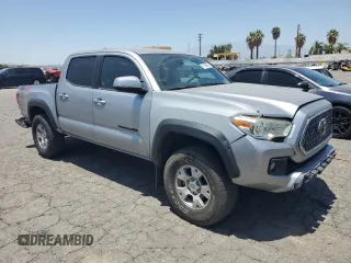 2019 Toyota Tacoma SR with VIN 3TMCZ5AN2KM277551, listed as a Copart auction lot 61586585 with 59,670 mi miles and Salvage title. Bid and sale history available at DreamBid. Image 4.