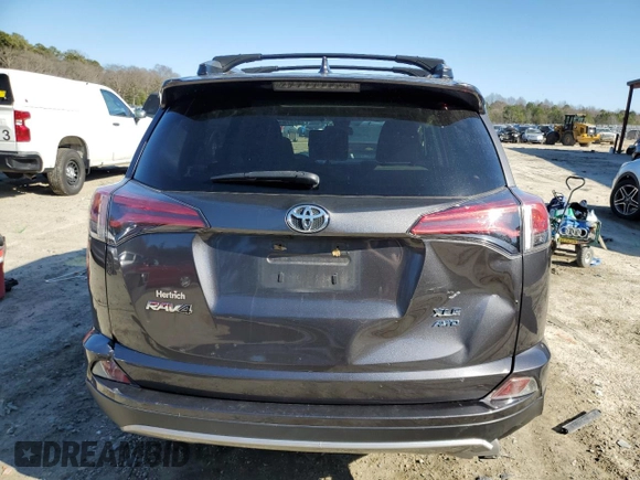 2018 Toyota RAV4 XLE with VIN JTMRFREV7JJ225848, listed as a Copart auction lot 47878355 with Not Provided miles and Salvage Title. Bid and sale history available at DreamBid. Image 6.