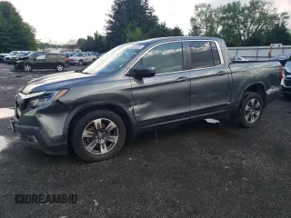 2017 Honda Ridgeline RTL-T with VIN 5FPYK3F64HB008598, listed as a Copart auction lot 54972075 with 66,760 mi miles and Salvage title. Bid and sale history available at DreamBid. Image 1.