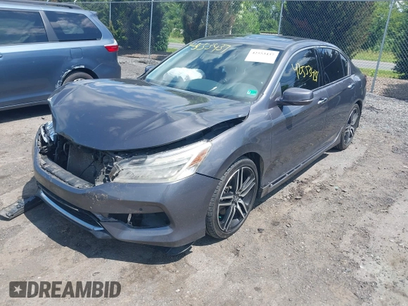 2017 Honda Accord Touring with VIN 1HGCR3F98HA015928, listed as a IAAI auction lot 42553437 with 168,902 mi miles and . Bid and sale history available at DreamBid. Image 17.