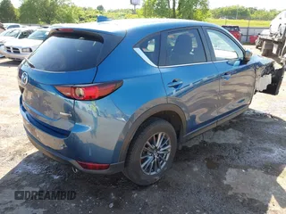 2020 Mazda CX-5 Touring z VIN JM3KFBCM2L0848233, wystawiony jako IAAI lot #42189719 z przebiegiem 80 893 mil mil oraz . Historia ofert i sprzedaży dostępna na DreamBid. Obrazek 4.
