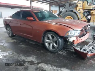2013 Dodge Charger RT with VIN 2C3CDXCT5DH605945, listed as a IAAI auction lot 41958140 with 84,049 mi miles. Bid and sale history available at carsss.com. Image 1.