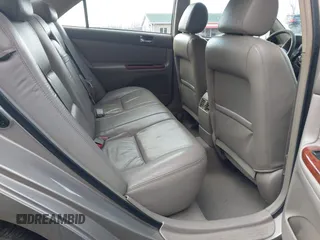 2003 Toyota Camry LE with VIN 4T1BE30K13U705105, listed as a IAAI auction lot 41696395 with 191,389 mi miles and . Bid and sale history available at DreamBid. Image 8.
