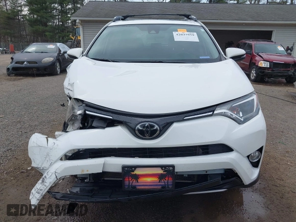 2018 Toyota RAV4 XLE with VIN JTMRFREV9JJ218173, listed as a IAAI auction lot 42037959 with 91,056 mi miles. Bid and sale history available at carsss.com. Image 13.