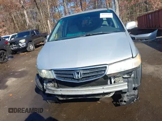 2004 Honda Odyssey EX z VIN 5FNRL18674B080319, wystawiony jako IAAI lot #40819411 z przebiegiem 201 820 mil mil oraz . Historia ofert i sprzedaży dostępna na DreamBid. Obrazek 13.