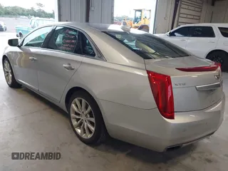 2016 Cadillac XTS Luxury Collection with VIN 2G61M5S34G9189820, listed as a IAAI auction lot 42660069 with 72,489 mi miles and . Bid and sale history available at DreamBid. Image 3.