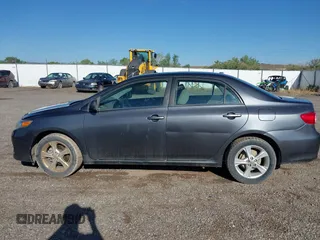 2013 Toyota Corolla L with VIN 2T1BU4EE9DC002558, listed as a IAAI auction lot 39670419 with 198,102 mi miles and . Bid and sale history available at DreamBid. Image 14.