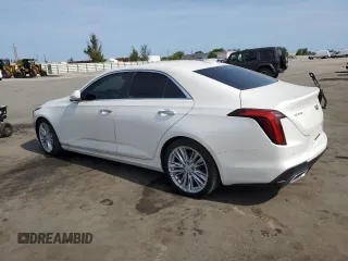 2021 Cadillac CT4 Premium Luxury z VIN 1G6DB5RK0M0113954, wystawiony jako Copart lot #58101165 z przebiegiem 33 957 mil mil oraz Tytuł czysty. Historia ofert i sprzedaży dostępna na DreamBid. Obrazek 2.