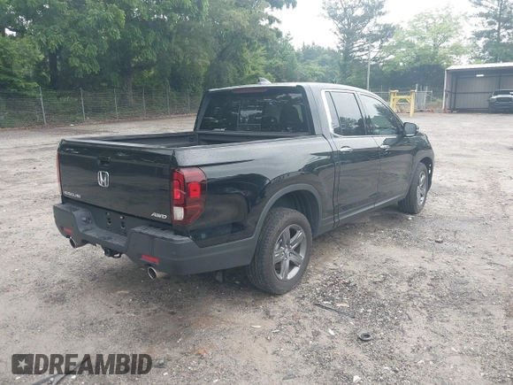 2023 Honda Ridgeline RTL-E with VIN 5FPYK3F77PB052828, listed as a IAAI auction lot 42366947 with 24,658 mi miles and . Bid and sale history available at DreamBid. Image 4.